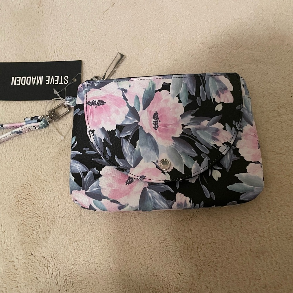 High-end, black, floral flap wristlet from Steve Madden